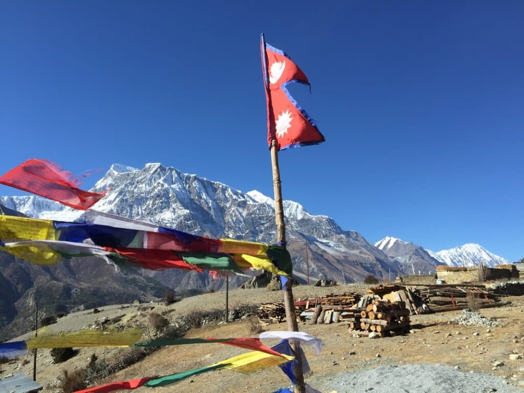 nepal flag on the way to tilicho lake trek