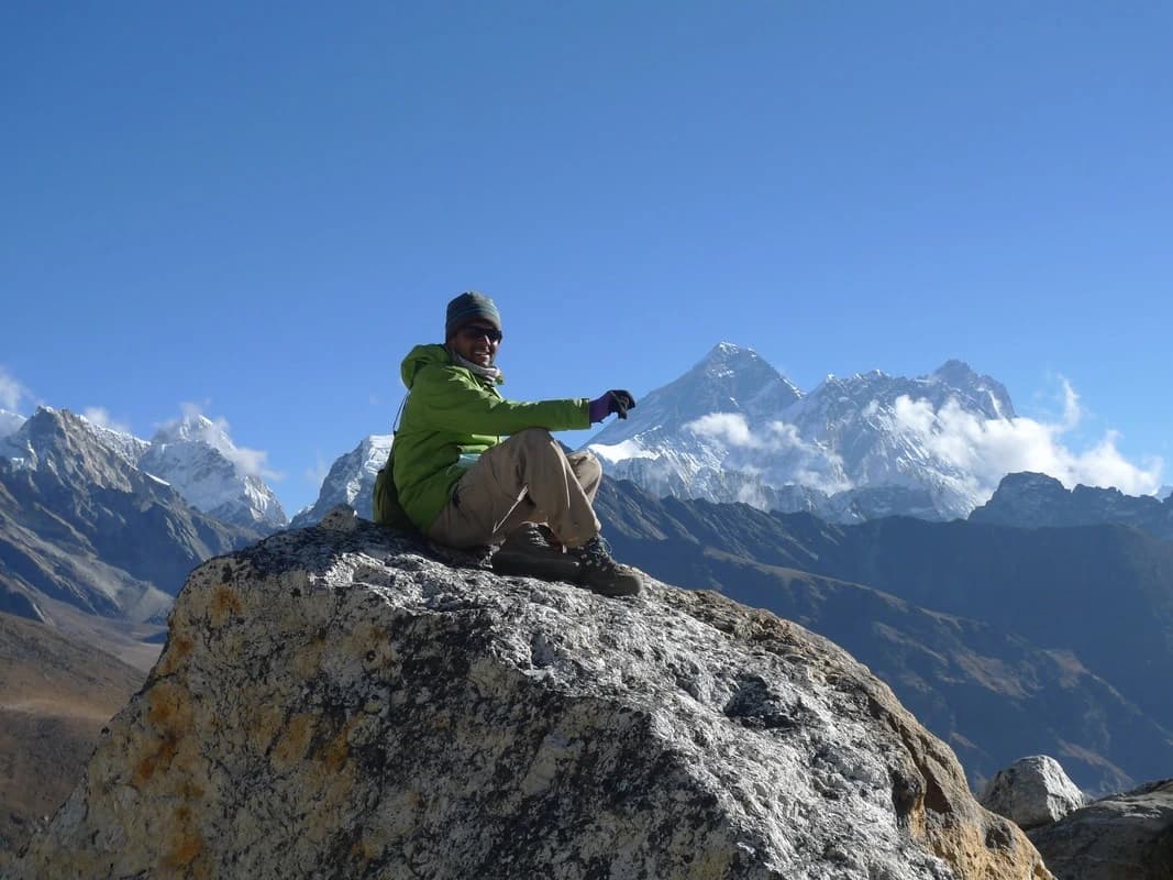 man enjoying the view of renjo la pass trek